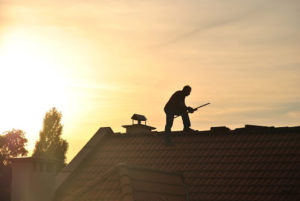 Man on a roof