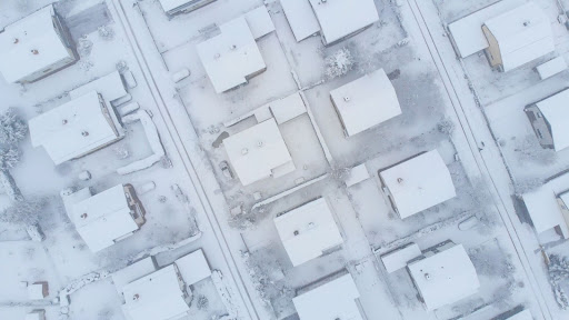 Overhead view of a snow covered neighborhood